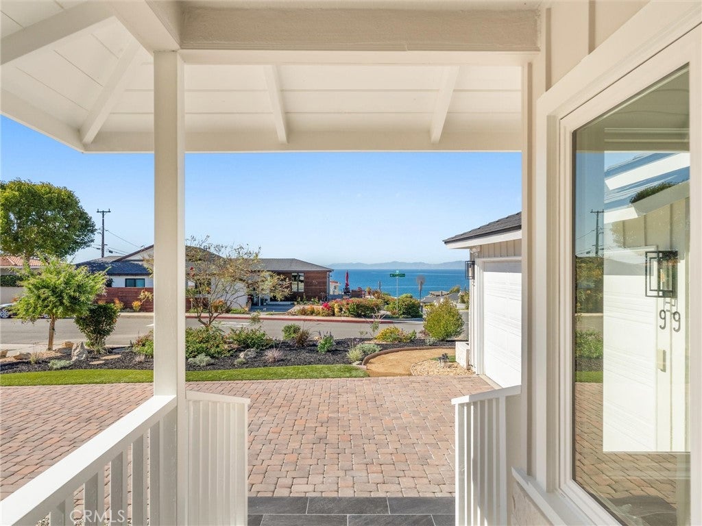 99 Calle Mayor, front porch with an ocean view