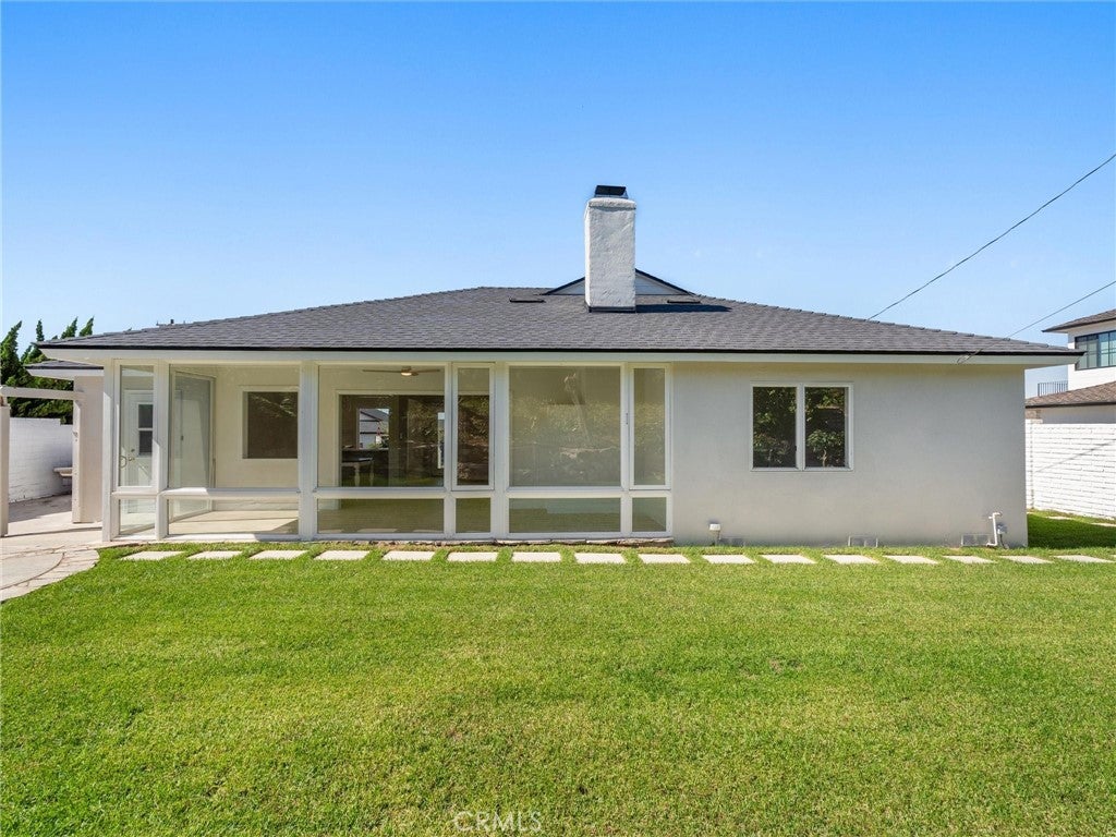 99 Calle Mayor, back of the home and lawn